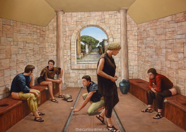 Mural of a communal Roman public toilet, at Puzzling World in Wanaka